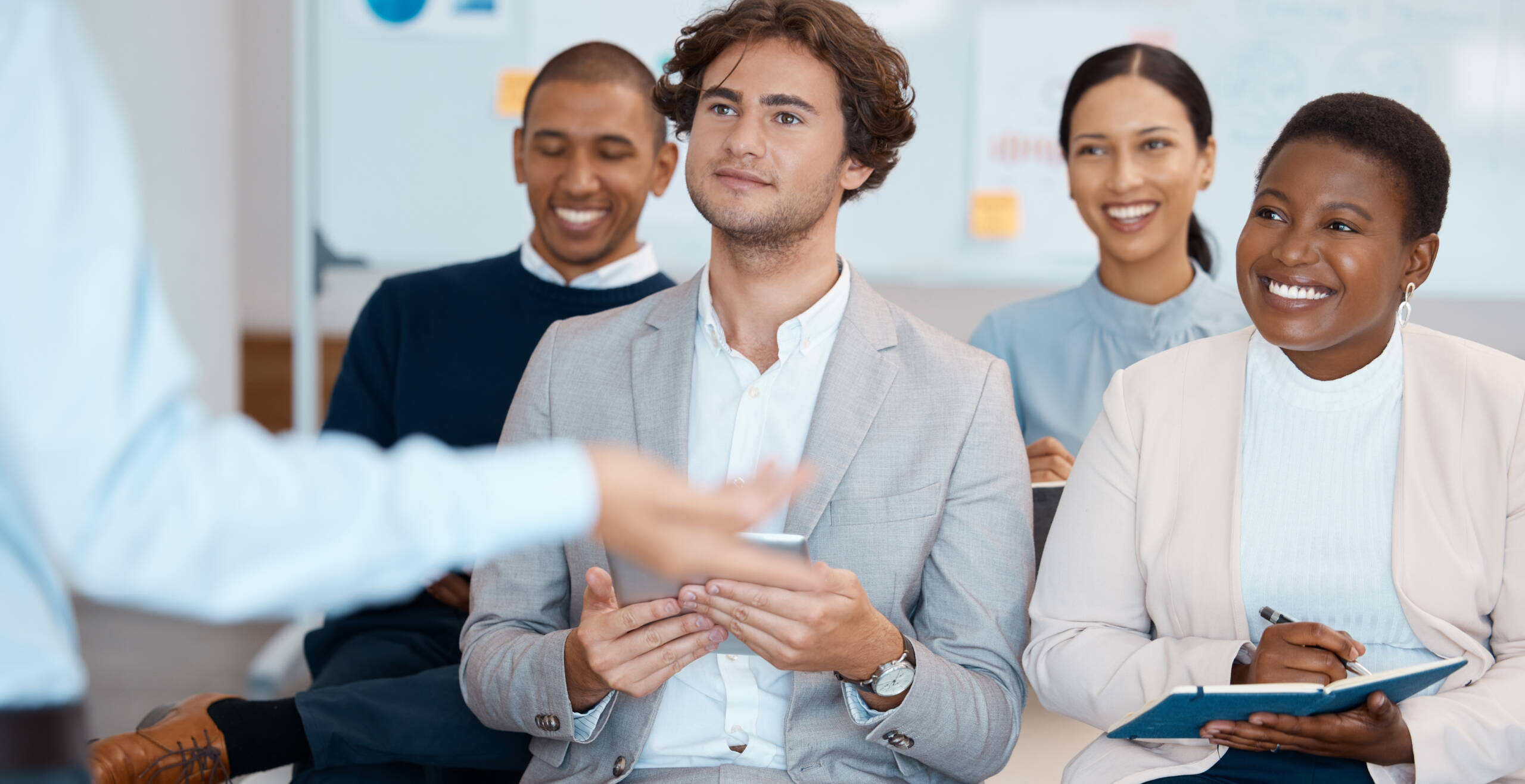 Audience, listening and training with a team in a meeting, seminar or workshop for learning and dev.